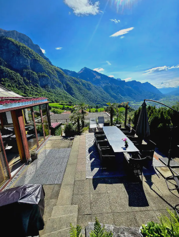 The House ALPENBLICK terrace with a view across the Swiss mountains