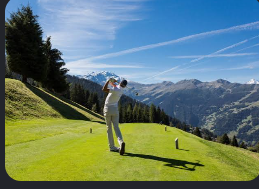 Golf green with a Swiss mountain backdrop, image supplied by you