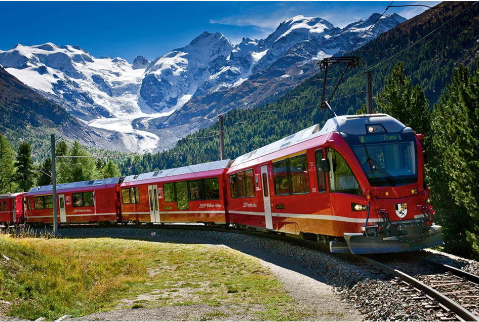 Red Swiss mountain train crossing the Alps, image supplied by you